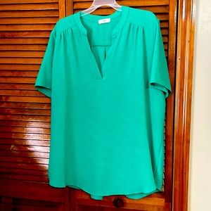 Green v neck blouse